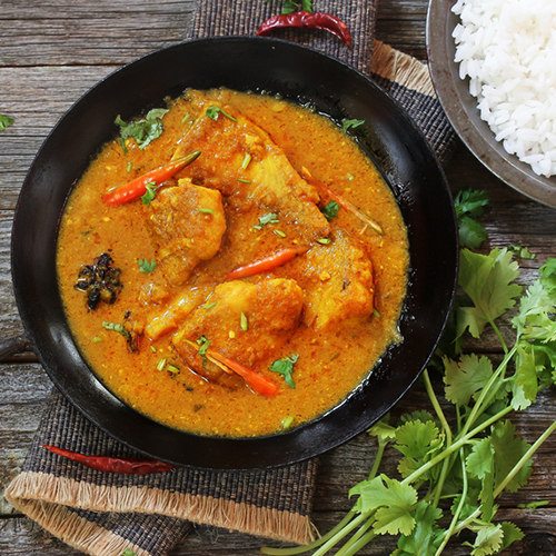 Traditional Goan fish curry served with Indian spices